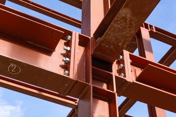 Close up detailed shot of beams and columns of a construction site.