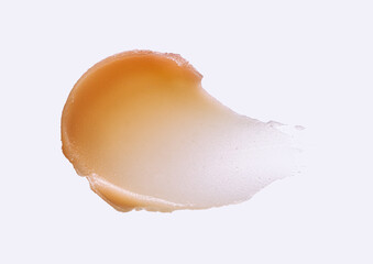 Cosmetic orange lip balm, cosmetic mask hair oil butter swatch on white background