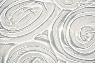 Gel collagen lubricant background transparent smudge gray. Photo.