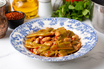 From Turkish cuisine, Turkish style green beans with olive oil with kidney beans.