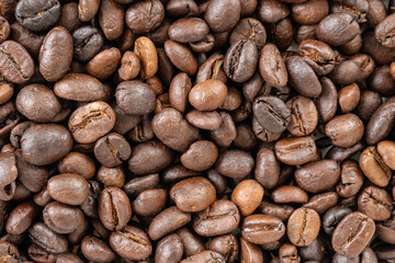 Fresh roasted brown coffee beans background