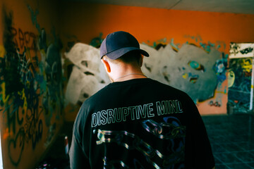 Portrait of young caucasian man graffiti artist.