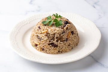 Traditional delicious Turkish food; rice pilaf with pine nuts and currants (Turkish name; ic pilav or pilaf)