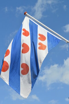 Frisian Flag - Friesland is one of twelve provinces of the Netherlands and probably the one with the strongest identity. It's flag has blue and white diagonal stripes and red 'pompeblede'.
