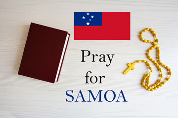 Fototapeta na wymiar Pray for Samoa. Rosary and Holy Bible background.