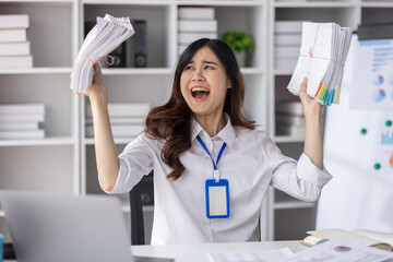 Asian women are stressed or has sore throat at office while working on laptop, Tired asian businesswoman with headache at office, feeling sick at work, copy space