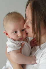 Mother embracing baby boy 3 months © Dmytro Surkov