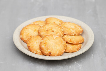 Few homemade cookies with almond on small dish