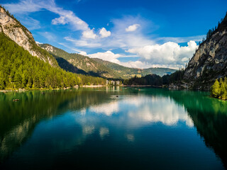 Autumn colors and reflections on Lake Braies and its valley.
