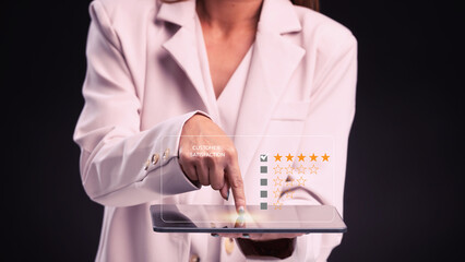 close up Woman hand using ipad User give rating to service experience on online application,...
