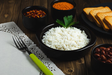Dominican food with white rice and varius spices