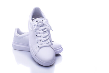 White sneakers on white background - 589143770
