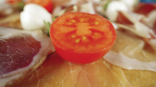 Cured ham. Seasoned, dry-aged meat. Slices of pork ham, pancetta, coppa, prosciutto crudo