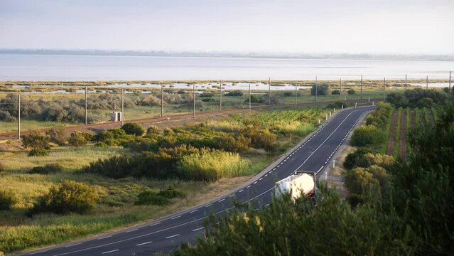 A road along the Leucate lake, in the south of France.