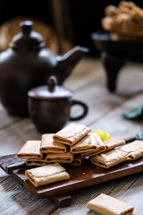 kuih kapit, kue kapit is a cookies filled peanut and butter