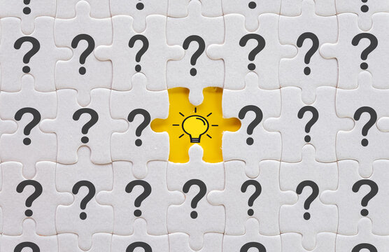 innovation,Creative idea and thinking,New ideas,Education concept.,Light bulb icon on Missing White jigsaw or puzzle among question mark icon over yellow background.