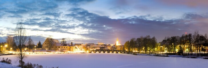 Panoramic shot of the illuminated skyline of Tirschenreuth, Germany at night in the winter