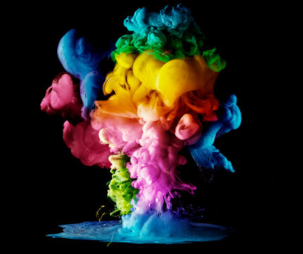 Acrylic colors and ink in water. paint on a black background, the best photo