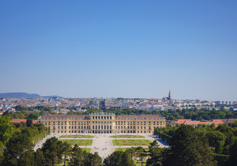 Fototapeta na wymiar Schoenbrunn is main summer residence of Austrian emperors of Habsburg dynasty, one of largest buildings of Austrian Baroque.