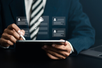 Human Resources (HR) management concept. Businessman filling out online employee appraisal form. Human resource management (HR), recruiting, leadership and team building.