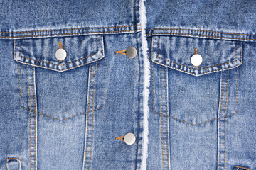 Fototapeta premium Stylish blue denim jacket with white fur lining.