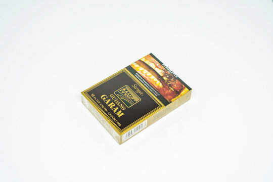 Jakarta, Indonesia. March 27, 2023: Surya Gudang Garam close up. Packaged cigarettes. Cigarette Surya Gudang Garam on isolated background