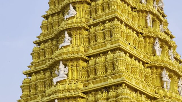 Main Gopuram (Tower) of the 400 year old ancient and historic temple of goddess Chamundi at Chamundi Hill, Mysore. South Indian Style Temple Tower Vimana