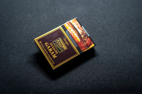 Jakarta, Indonesia. March 27, 2023: Surya Gudang Garam close up. Packaged cigarettes. Cigarette Surya Gudang Garam on isolated background