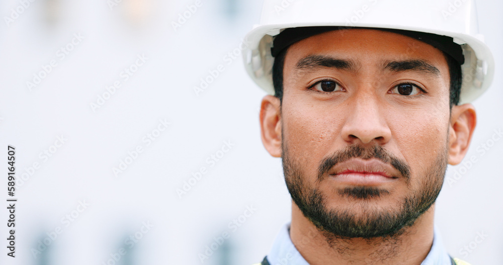Aufkleber Face of a contractor and maintenance manager at a construction site with copy space. Portrait of an engineer with a hardhat overseeing a successful project development