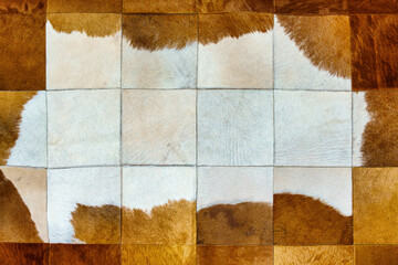 Carpet made from square pieces of horsehair. Abstract background.