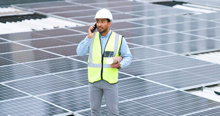 Ambitious, happy and confident solar power installer, engineer and electrician talking on a phone...