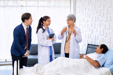 Hospital treatment room relative visit patient lay on bed doctor use stethoscope measurement