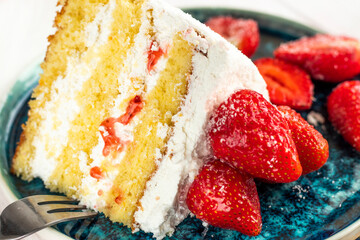 selective focus. festive berry cake. homemade strawberry cake cut. Strawberry pie decorated with...