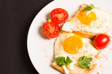 Sunny eggs - traditional breakfast with bell pepper, tomato. Healthy food.