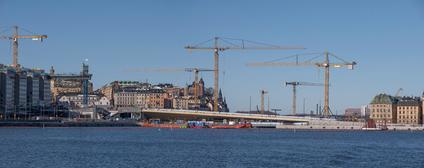 Naklejka premium Construction site the new sluice at the old town Gamla Stan, a sunny spring day in Stockholm