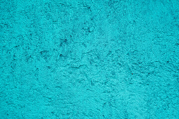 Turquoise painted concrete wall background texture