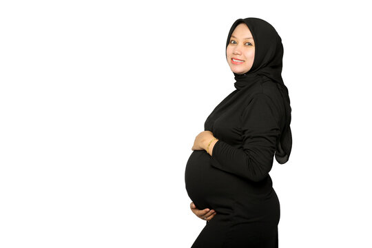 Happy Pregnant woman hands holding belly on white background. beautiful young pregnant mother on white background.