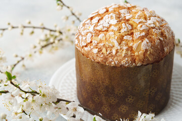Easter cake with sugar powder on gray background