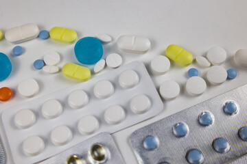 Pills or drugs in plastic blisters or removed. Medicine or pharmacology cooncept