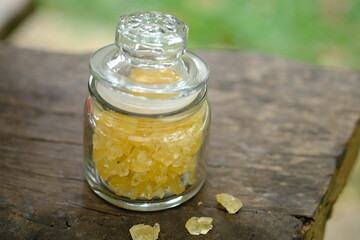 sugar cubes in a clear glass jar. Rock sugar has a sweeter level than granulated sugar, it can be used for tea, coffee, or herbal drinks.