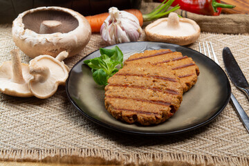 Tasty vegetarian burgers made from healthy quinoa, basil, portobello champignon and shiitake mushrooms