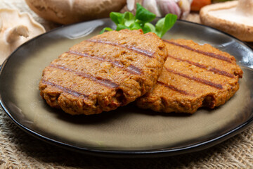Tasty vegetarian burgers made from healthy quinoa, basil, portobello champignon and shiitake mushrooms