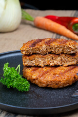 Tasty vegan burgers made from vegetarian plant based soya beans imitation meat