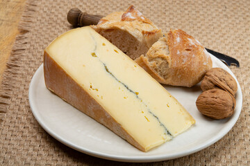 Cheese collection, French Morbier semi-soft cow milk cheese with black mold layer