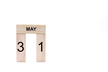 May 31 displayed wooden letter blocks on white background with space for print. Concept for calendar, reminder, date. 