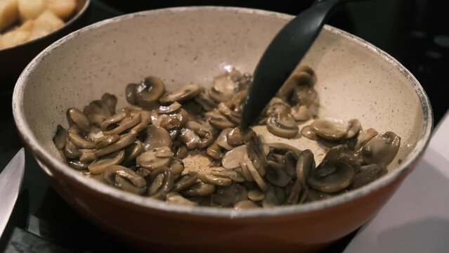 making some mushrooms in a pan