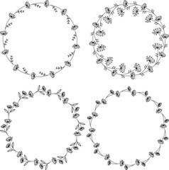 Set of four round hand drawn hand drawn floral frames. Vector outline wreaths in doodle style.