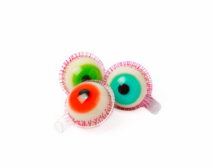 Halloween gummy eye candy isolated on white background.Classic candy sweets for Halloween with.Halloween holiday concept with candy corn and Jack-o-lantern.