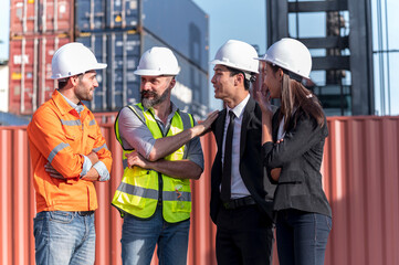 group of businessman, Logistics engineer and inspector and businessman cheer up  and happy to about success business deal and project in shipping containerin commercial transport port