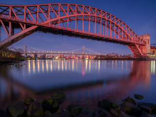 Robert F. Kennedy Bridge and Midtown at sunrise	with long exposure